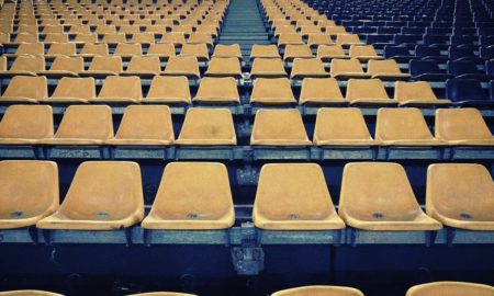 yellow chairs in football stadium