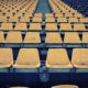 yellow chairs in football stadium